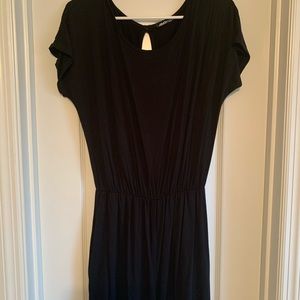 Black romper with back key hole and leg ruffle